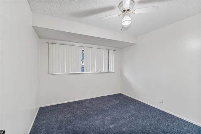 a view of a lake with a house