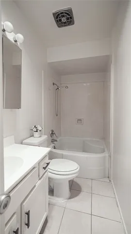 an aerial view of residential houses with city view