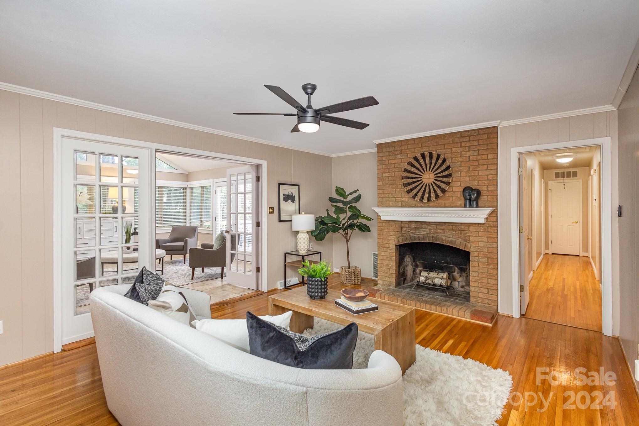 4011 Chandworth Road Charlotte, NC 28210 - Photo 13 of 30 a living room with furniture and a fireplace