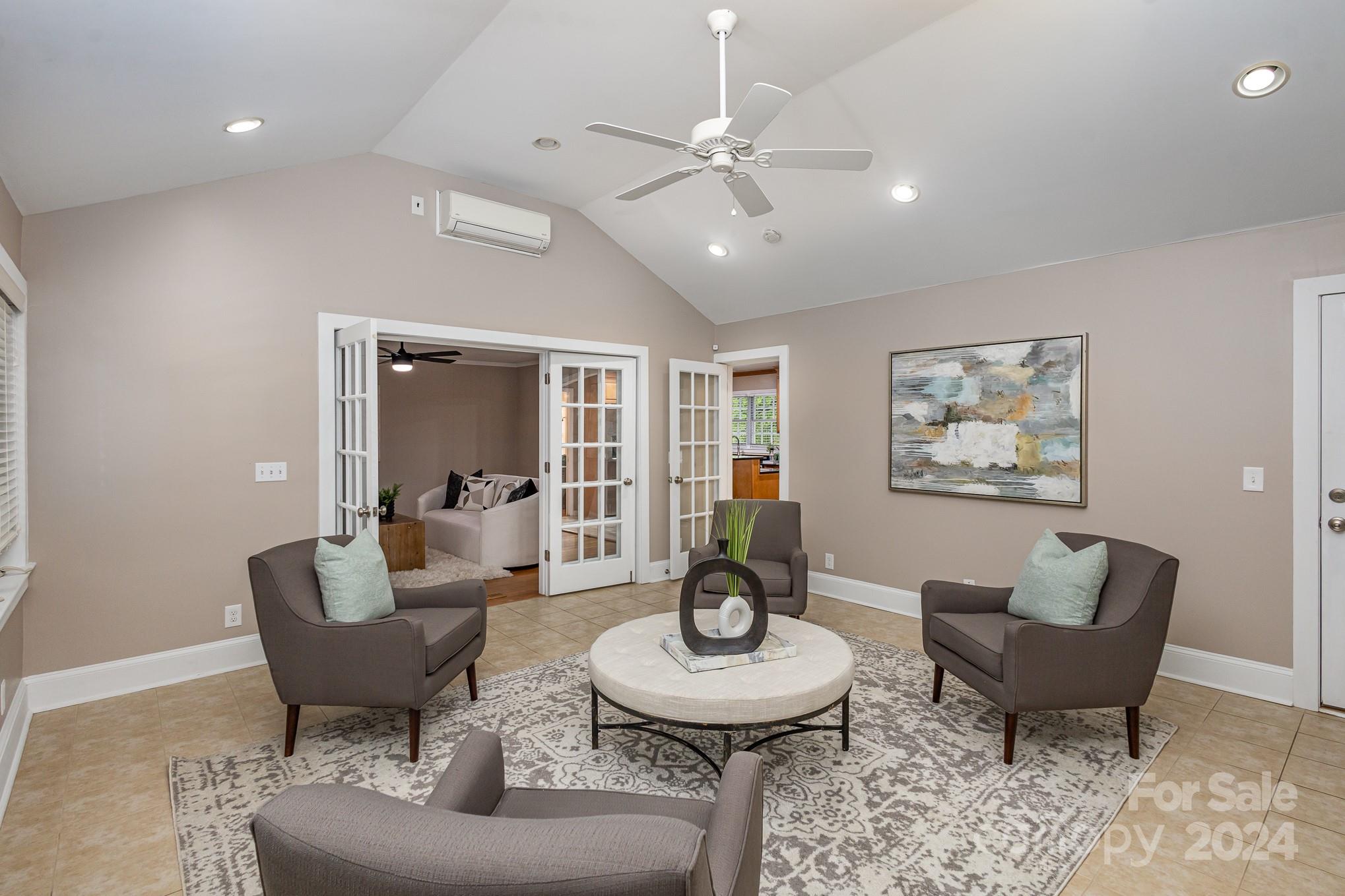 4011 Chandworth Road Charlotte, NC 28210 - Photo 15 of 30 a living room with furniture and a large window