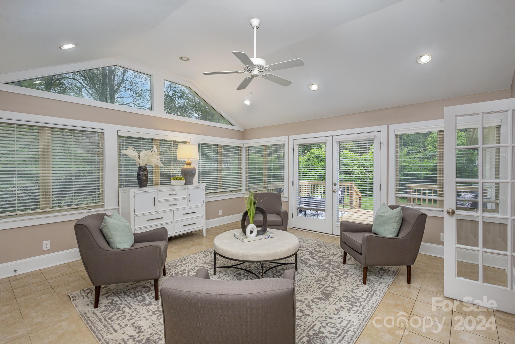 4011 Chandworth Road Charlotte, NC 28210 - Photo 16 of 30 a living room with furniture and a table