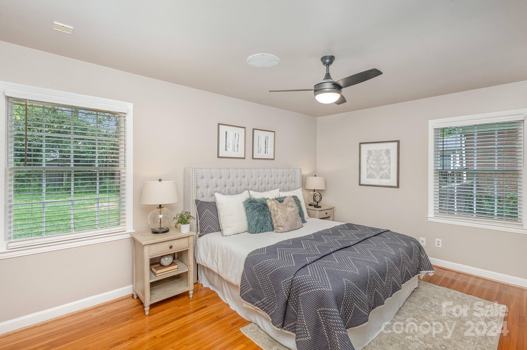 4011 Chandworth Road Charlotte, NC 28210 - Photo 20 of 30 a bedroom with a large bed and a window