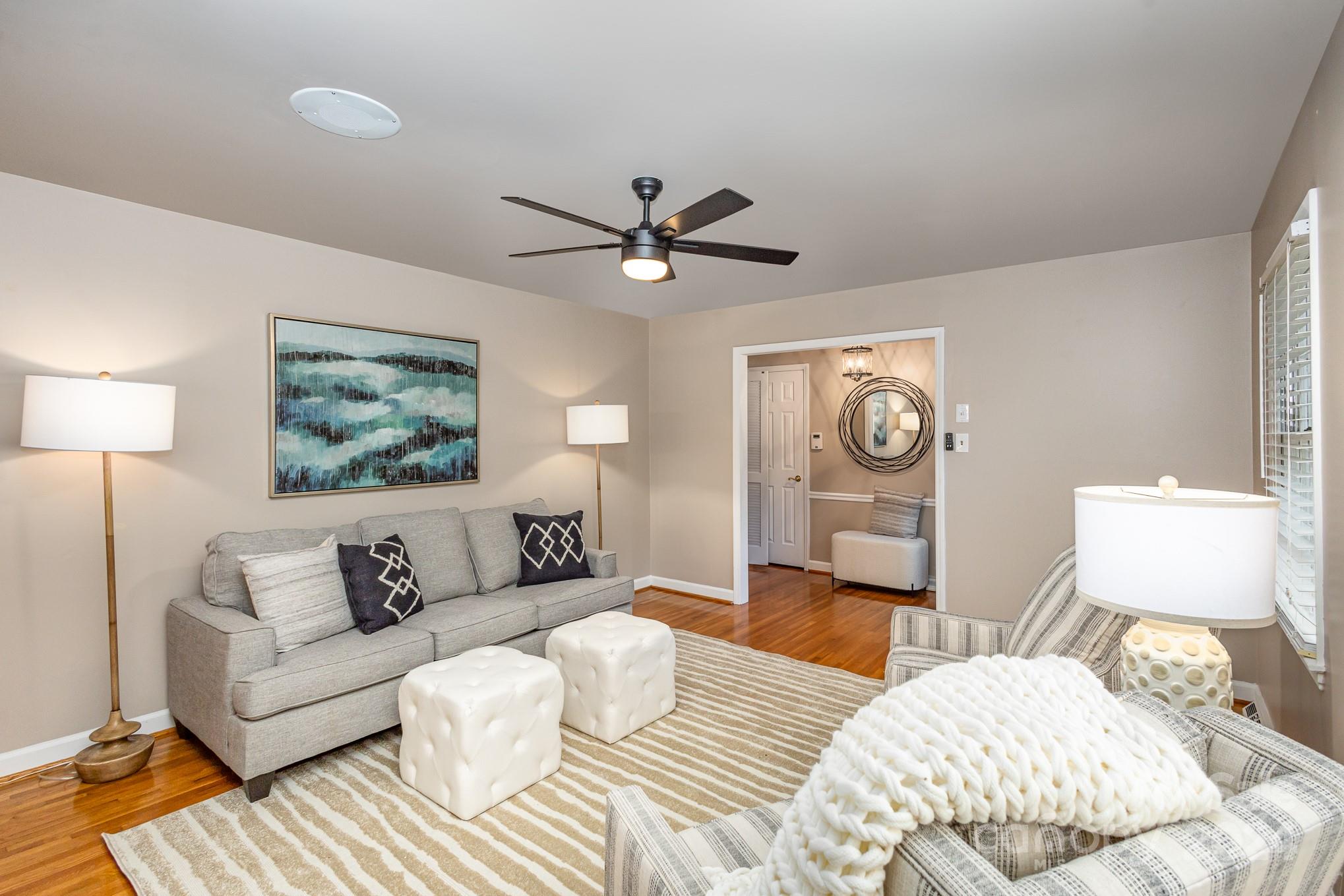 4011 Chandworth Road Charlotte, NC 28210 - Photo 4 of 30 a bedroom with a bed and a couch