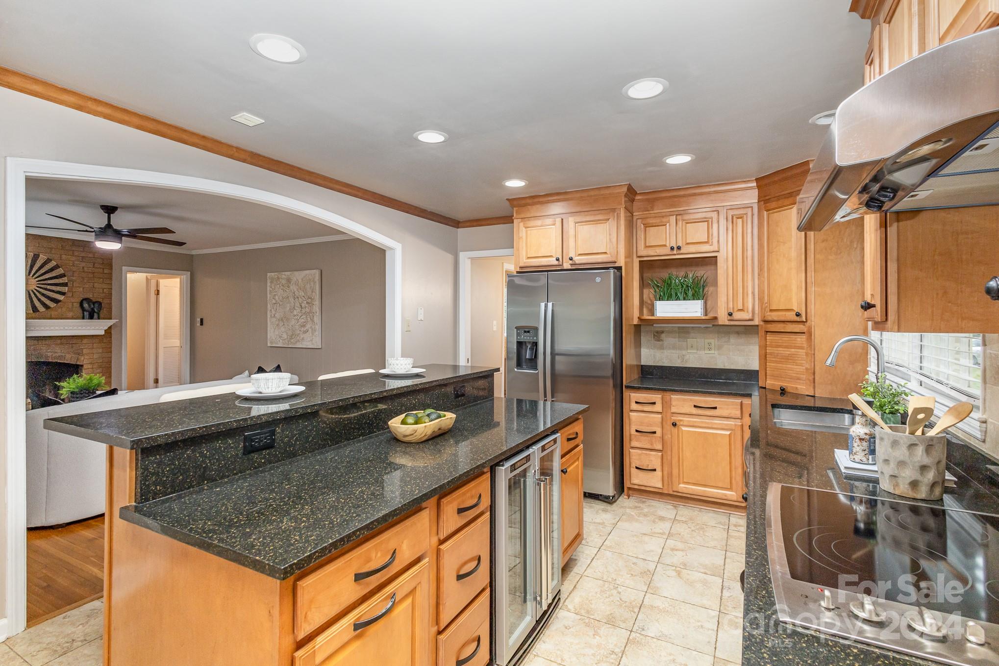 4011 Chandworth Road Charlotte, NC 28210 - Photo 10 of 30 a kitchen with stainless steel appliances granite countertop a sink and cabinets