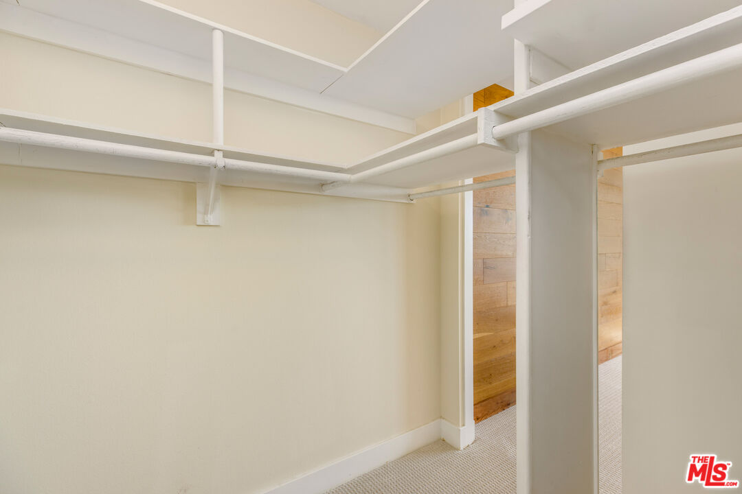 2385 Roscomare Road, Unit F4 Los Angeles, CA 90077 - Photo 12 of 57 a view of walk in closet