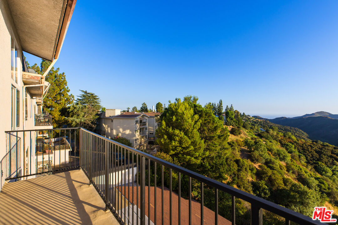 2385 Roscomare Road, Unit F4 Los Angeles, CA 90077 - Photo 29 of 57 a view of a balcony with an outdoor space