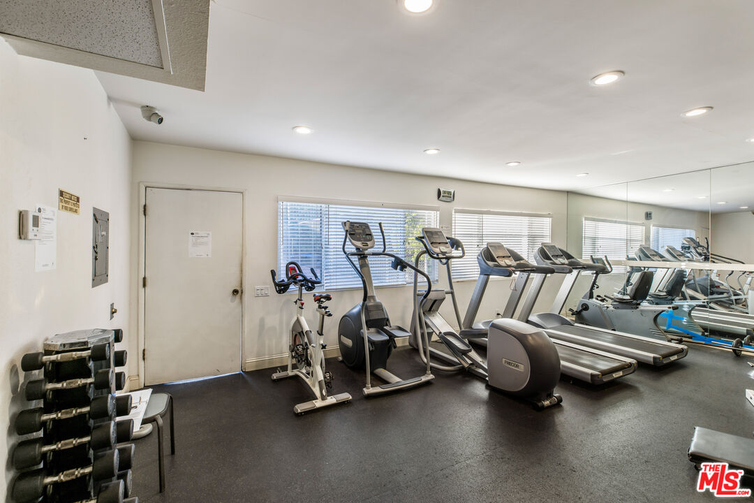 2385 Roscomare Road, Unit F4 Los Angeles, CA 90077 - Photo 35 of 57 a view of a room with gym equipment
