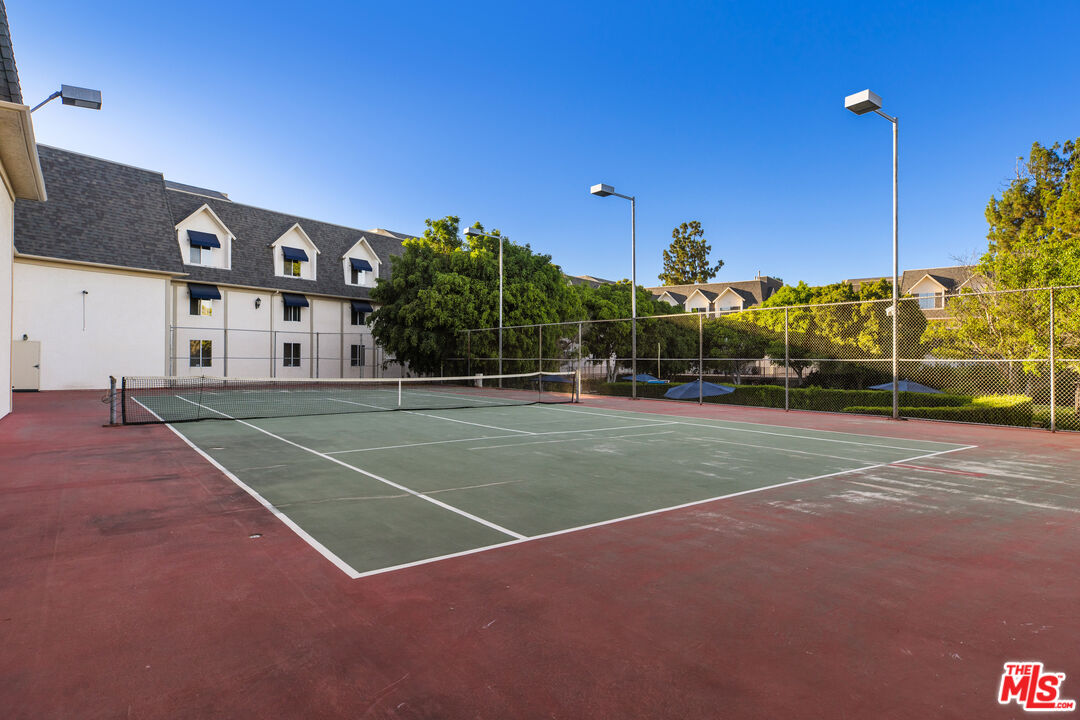 2385 Roscomare Road, Unit F4 Los Angeles, CA 90077 - Photo 36 of 57 a view of a tennis court