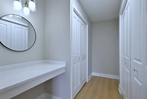 a view of a hallway with entryway