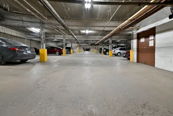 a view of parking garage with lots of stuff