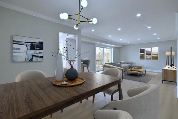 a living room with furniture and a chandelier
