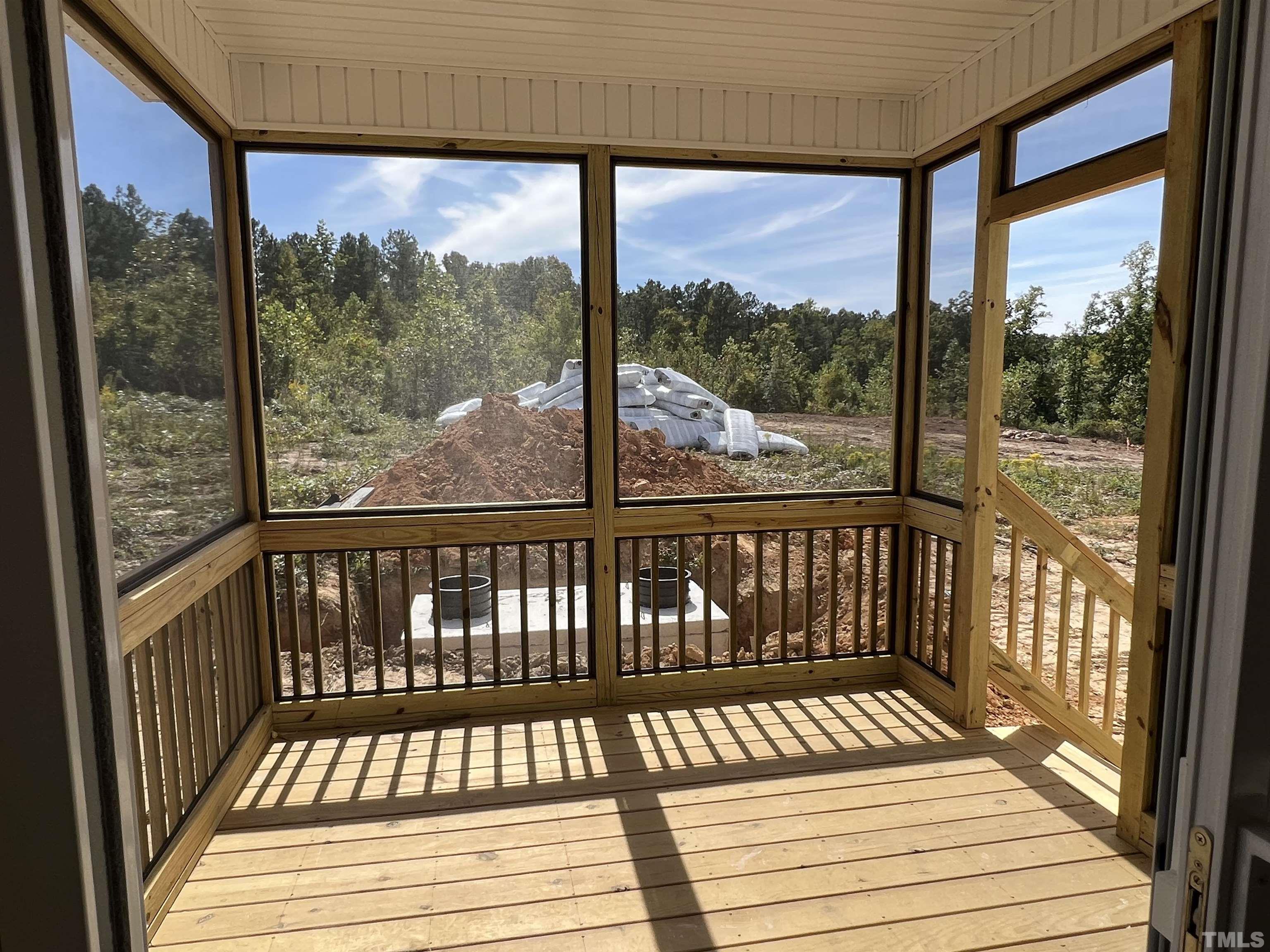4450 Debnam Road Zebulon, NC 27597 - Photo 6 of 6 a view of balcony with wooden floor