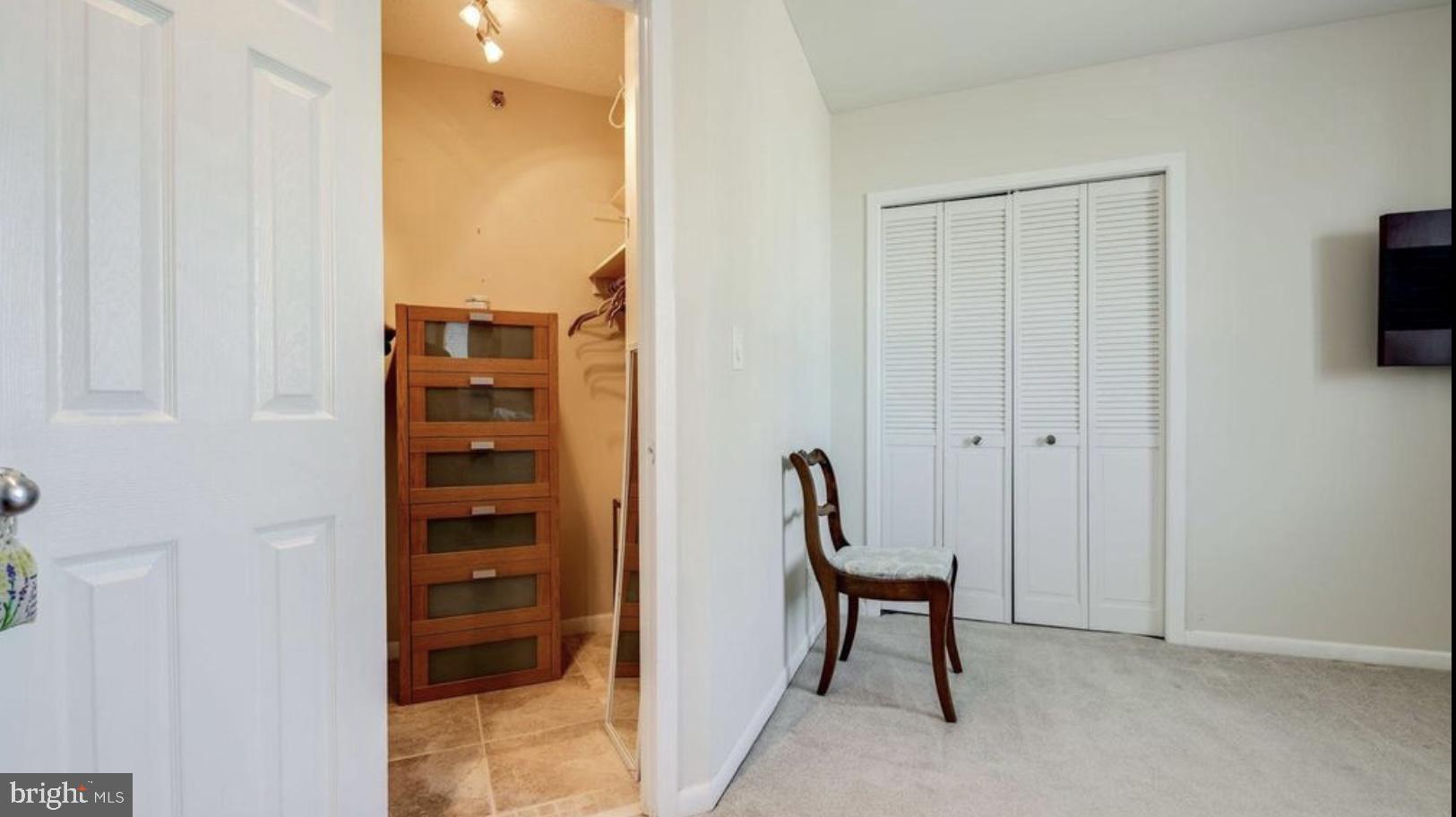 5505 Seminary Road, Unit 914N Falls Church, VA 22041 - Photo 24 of 29 a view of a bedroom with a wardrobe space