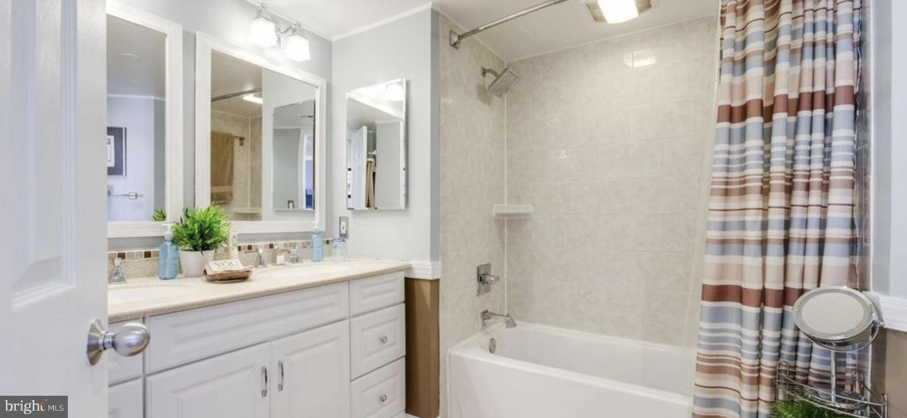 5505 Seminary Road, Unit 914N Falls Church, VA 22041 - Photo 25 of 29 a bathroom with a sink and a mirror