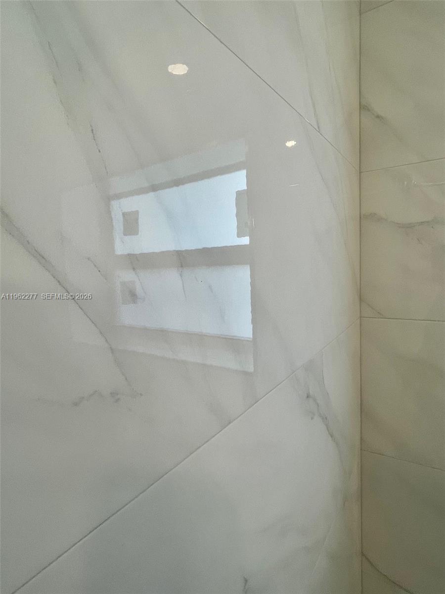 5701 Northwest 28th Street, Unit 13 Lauderhill, FL 33313 - Photo 17 of 34 a view of empty room