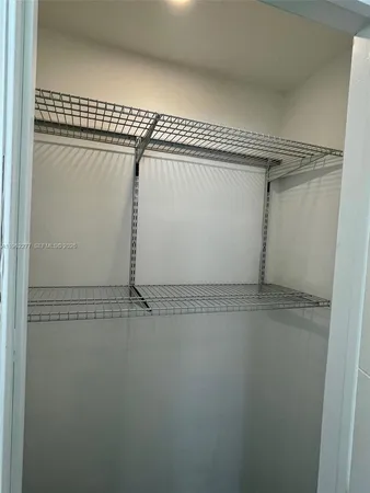 a view of a swimming pool with an outdoor space