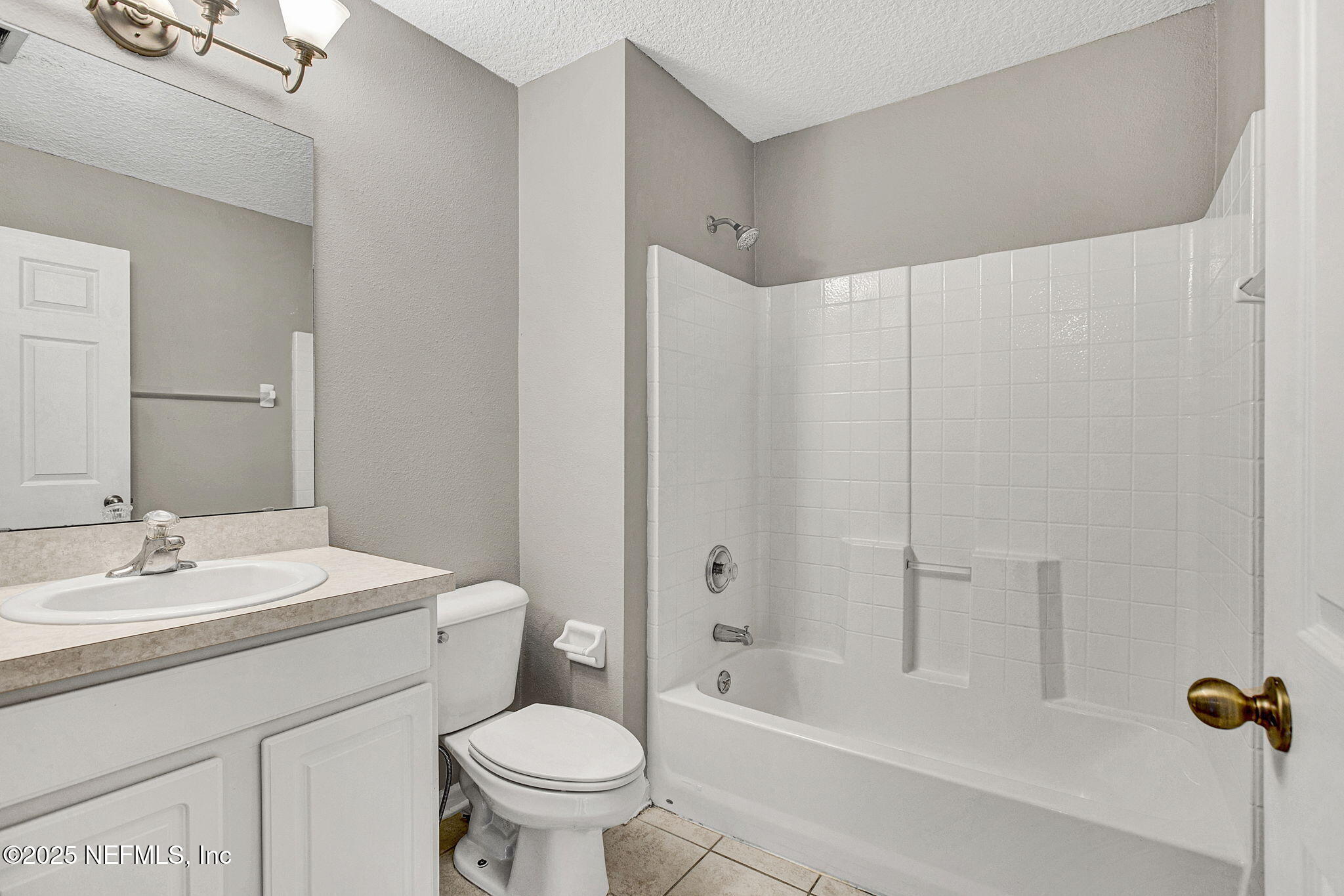 2105 South Cranbrook Avenue St. Augustine, FL 32092 - Photo 18 of 23 a bathroom with a sink toilet and shower