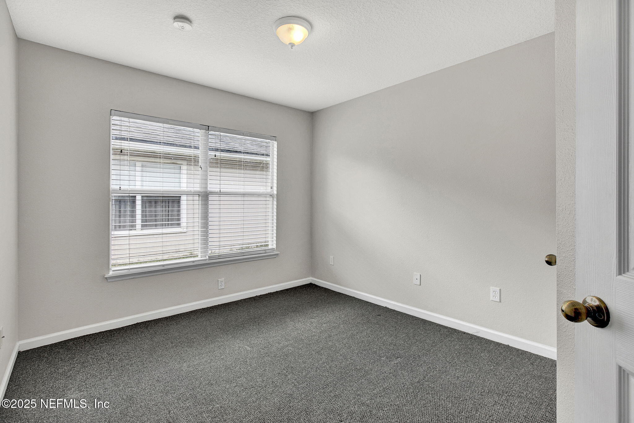 2105 South Cranbrook Avenue St. Augustine, FL 32092 - Photo 19 of 23 an empty room with a window