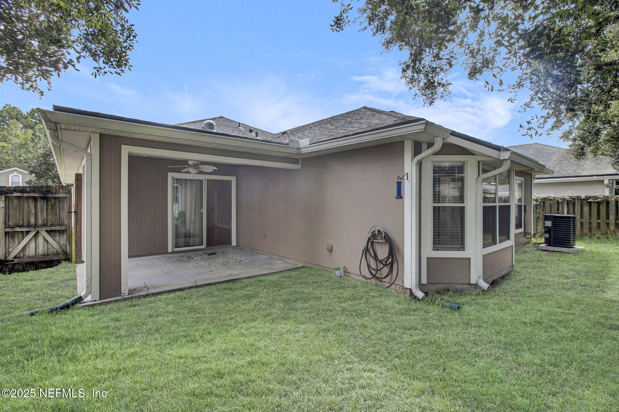 2105 South Cranbrook Avenue St. Augustine, FL 32092 - Photo 23 of 23 a view of house with a big yard and large tree