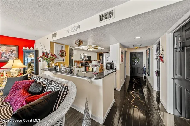 a bedroom with bed and a mirror