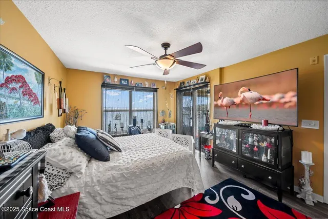 a bathroom with a sink mirror and a shower