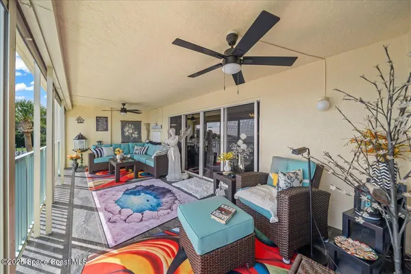 a view of a living room and kitchen