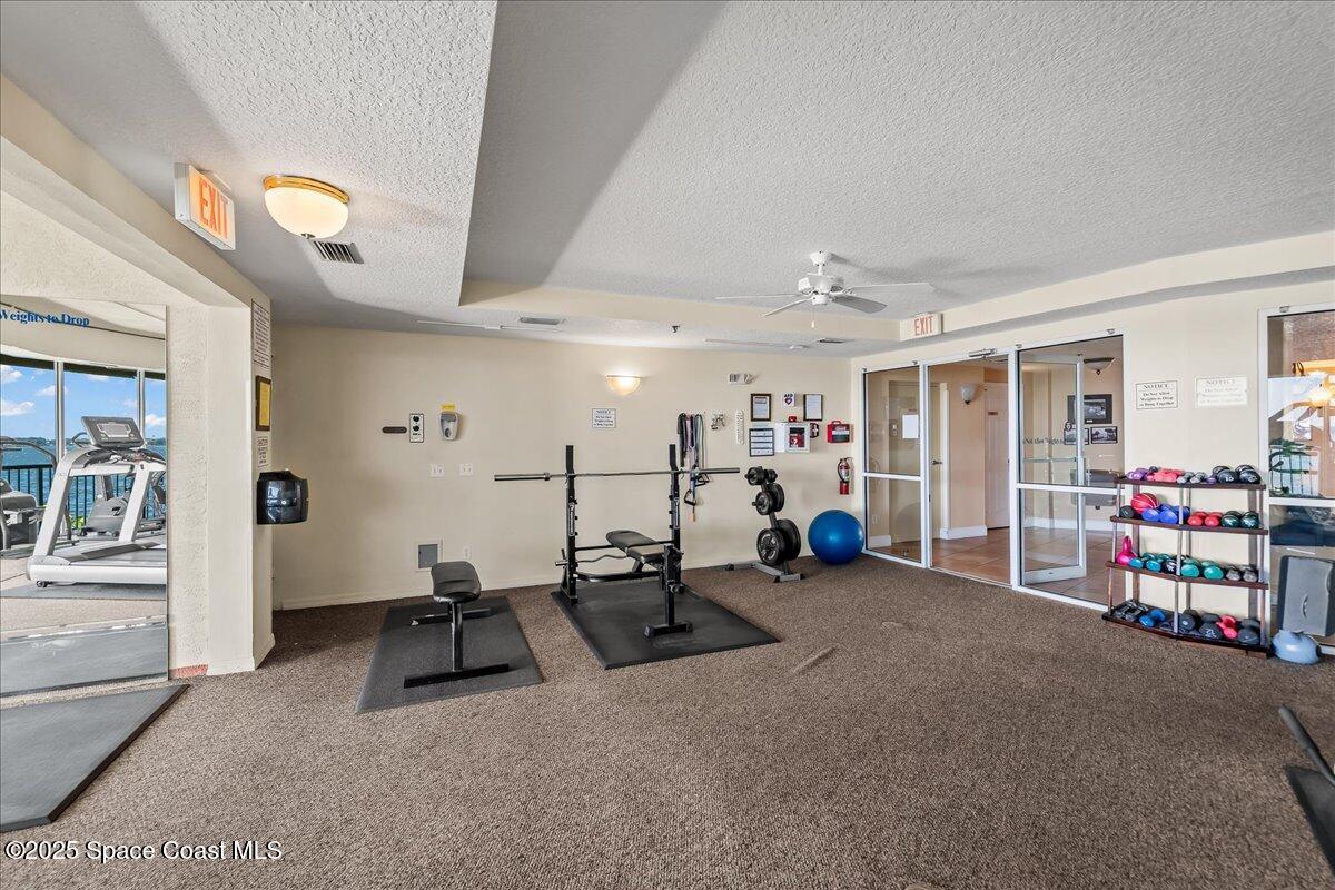 104 Riverside Drive, Unit 203 Cocoa, FL 32922 - Photo 38 of 48 a view of a room with gym equipment