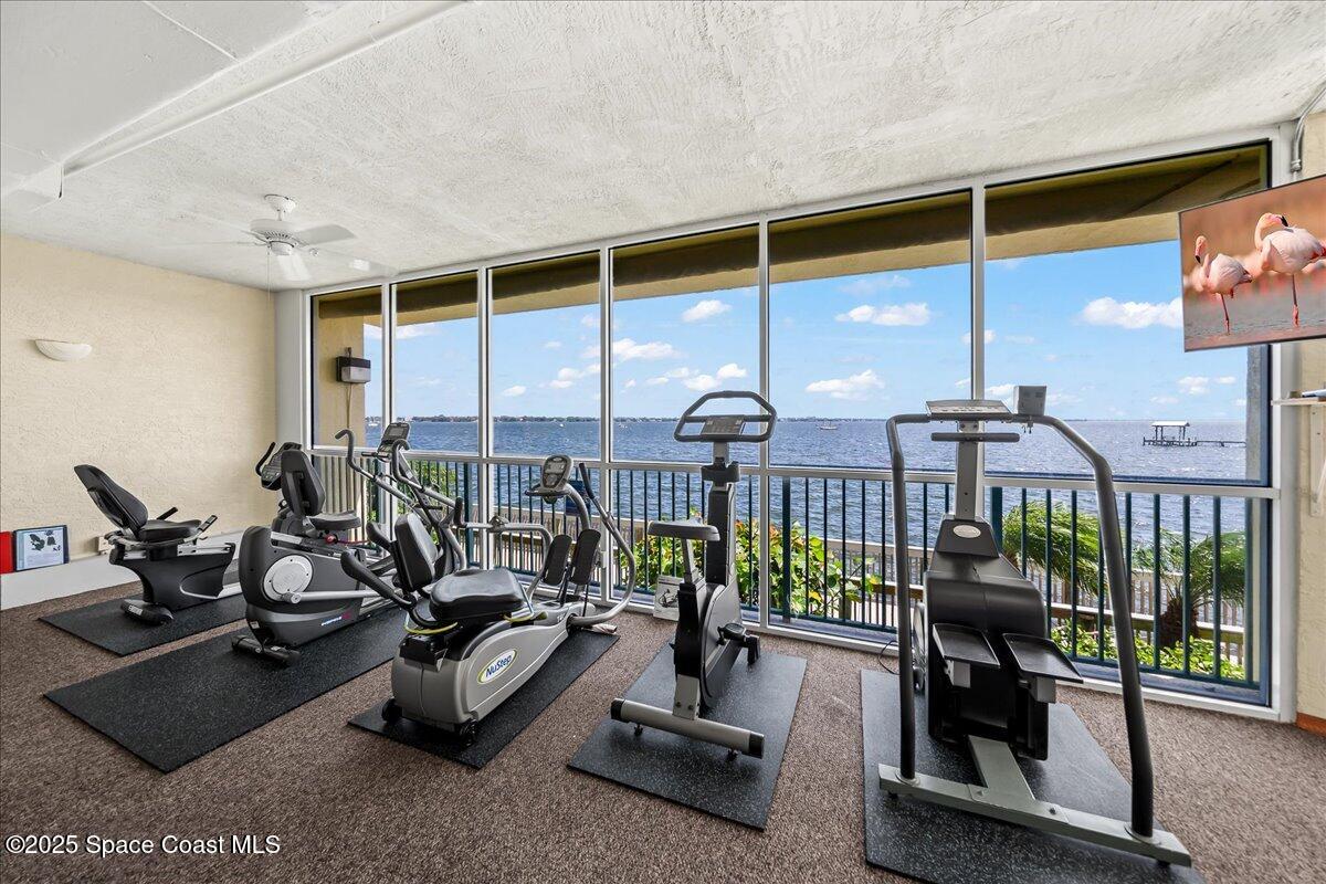 104 Riverside Drive, Unit 203 Cocoa, FL 32922 - Photo 39 of 48 a room with gym equipment