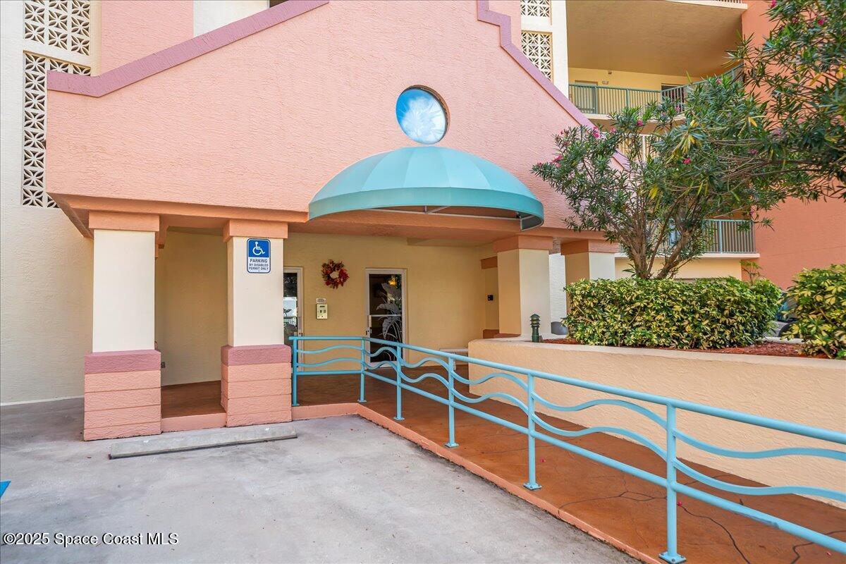 104 Riverside Drive, Unit 203 Cocoa, FL 32922 - Photo 7 of 48 a view of a house with a staircase