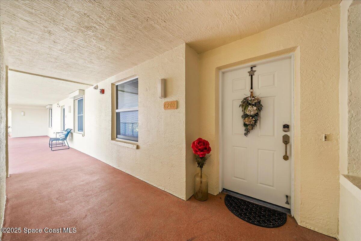104 Riverside Drive, Unit 203 Cocoa, FL 32922 - Photo 10 of 48 wooden floor in a livingroom