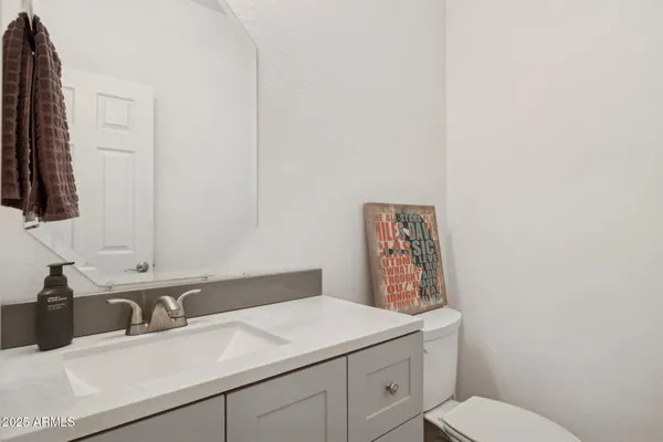 a bathroom with a sink and a toilet
