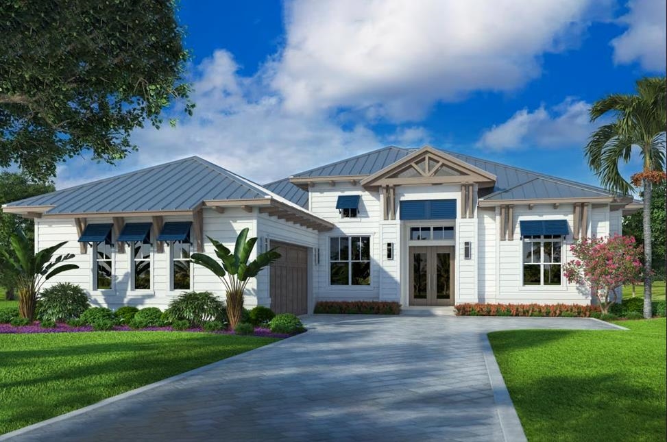 3 Ranshire Lane Palm Coast, FL 32164 - Photo 1 of 11 a front view of a house with a garden