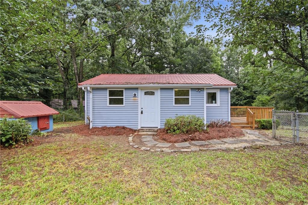 6815 Bannister Road Cumming, GA 30028 - Photo 2 of 35