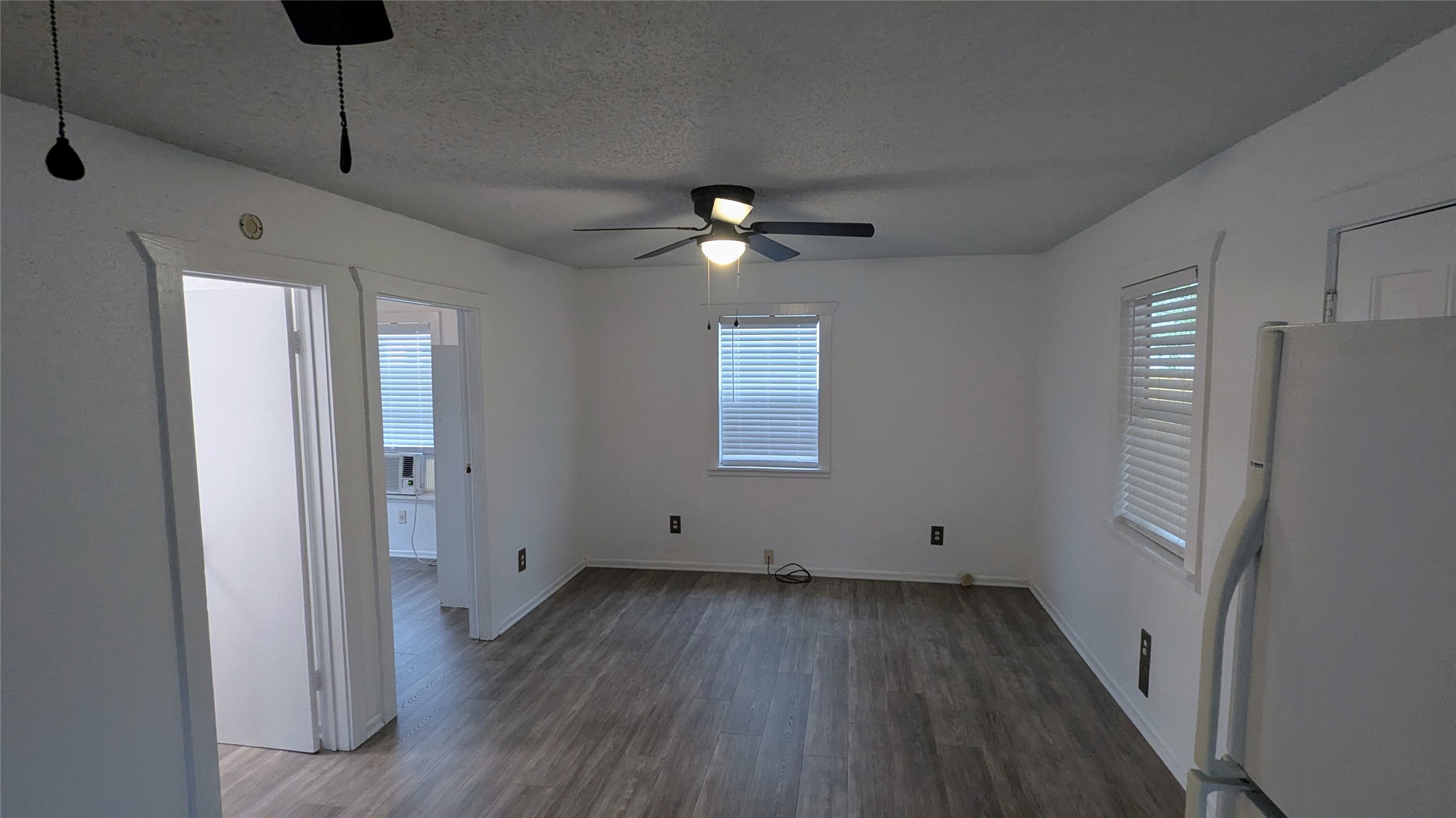 4615 Woodside Street Houston, TX 77023 - Photo 18 of 25 a view of an empty room with a window
