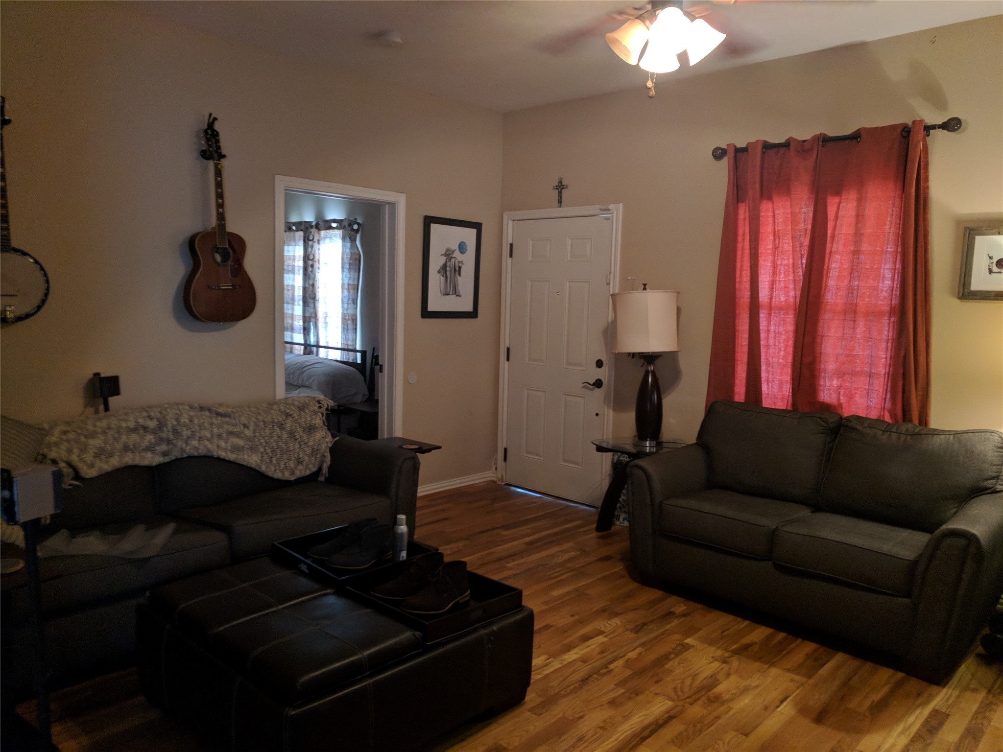 4615 Woodside Street Houston, TX 77023 - Photo 5 of 25 a living room with furniture and a mirror