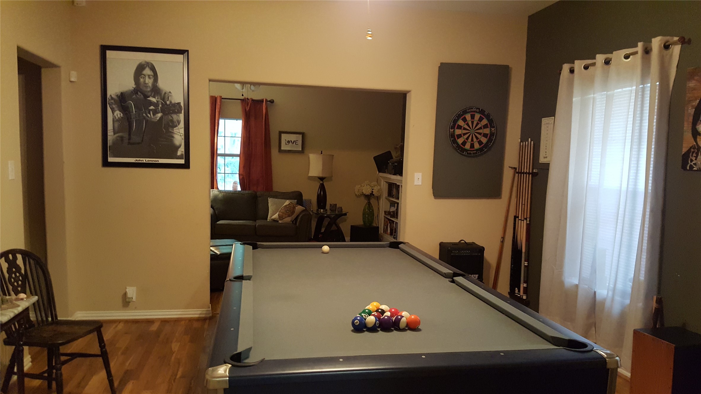 4615 Woodside Street Houston, TX 77023 - Photo 6 of 25 a room with furniture and air hockey table