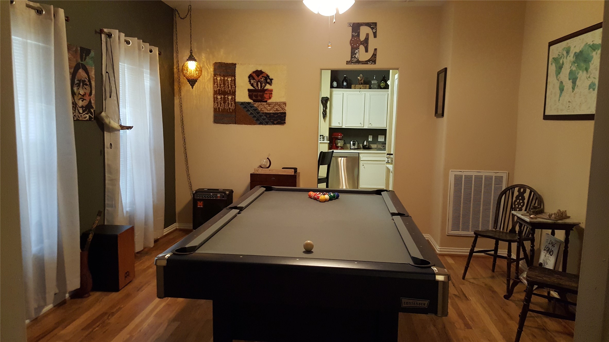 4615 Woodside Street Houston, TX 77023 - Photo 7 of 25 a view of a workspace with furniture