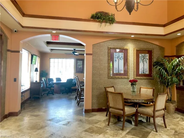 a view of a livingroom with furniture and windows