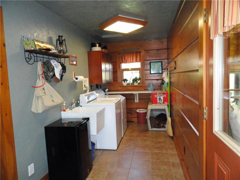 528 Dick Station Road Irwin, PA 15642 - Photo 18 of 25 The convenient first floor laundry/mud room is right off of the garage