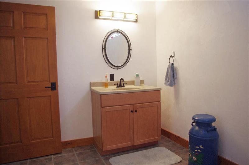 528 Dick Station Road Irwin, PA 15642 - Photo 22 of 25 8.5 x 11.5 powder room in lower level, plumbed for a future shower