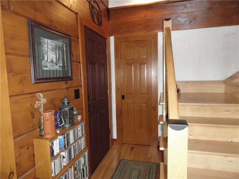 528 Dick Station Road Irwin, PA 15642 - Photo 4 of 25 Welcome Home! Hickory floors and staircase. Pocket door on coat closet