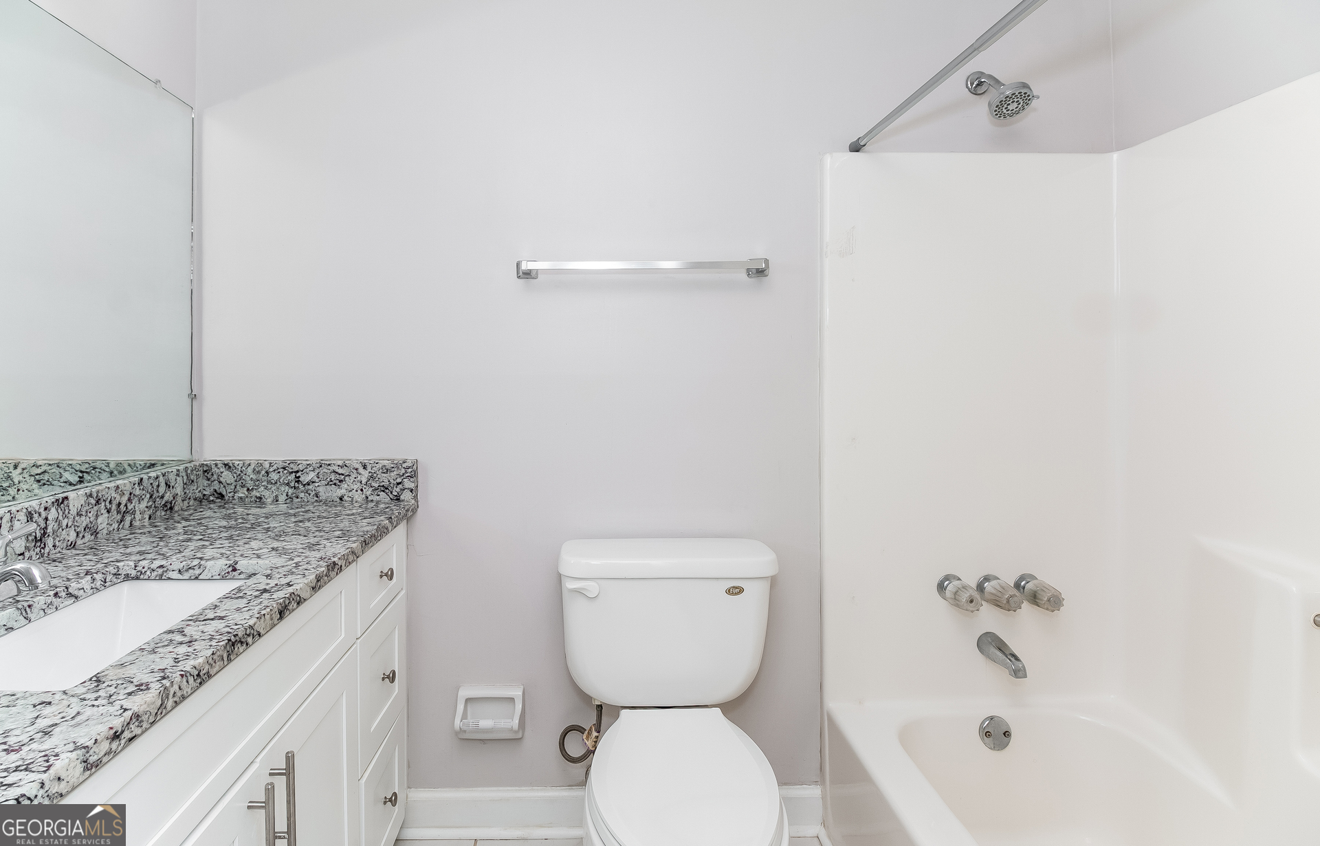 3020 Creel Road South Fulton, GA 30349 - Photo 12 of 18 a bathroom with a granite countertop sink toilet and shower