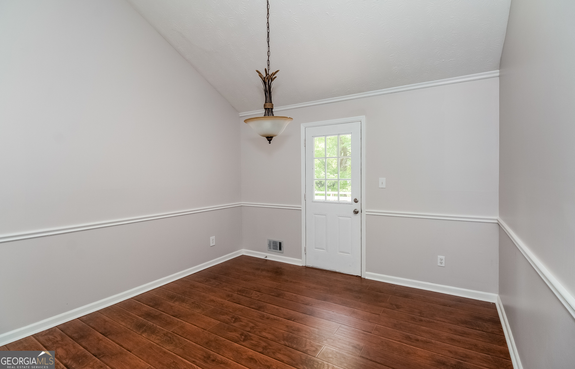 3020 Creel Road South Fulton, GA 30349 - Photo 3 of 18 a view of a room with wooden floor closet and windows
