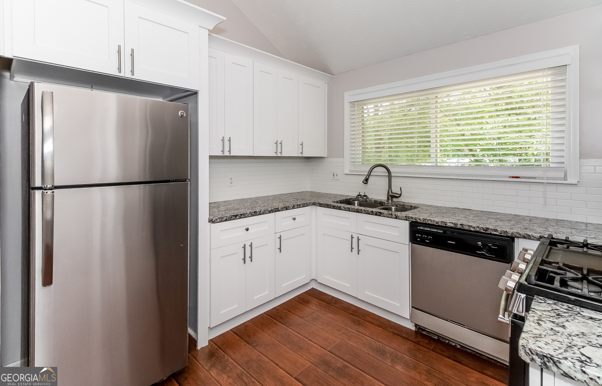 3020 Creel Road South Fulton, GA 30349 - Photo 6 of 18 a white refrigerator freezer sitting in a kitchen