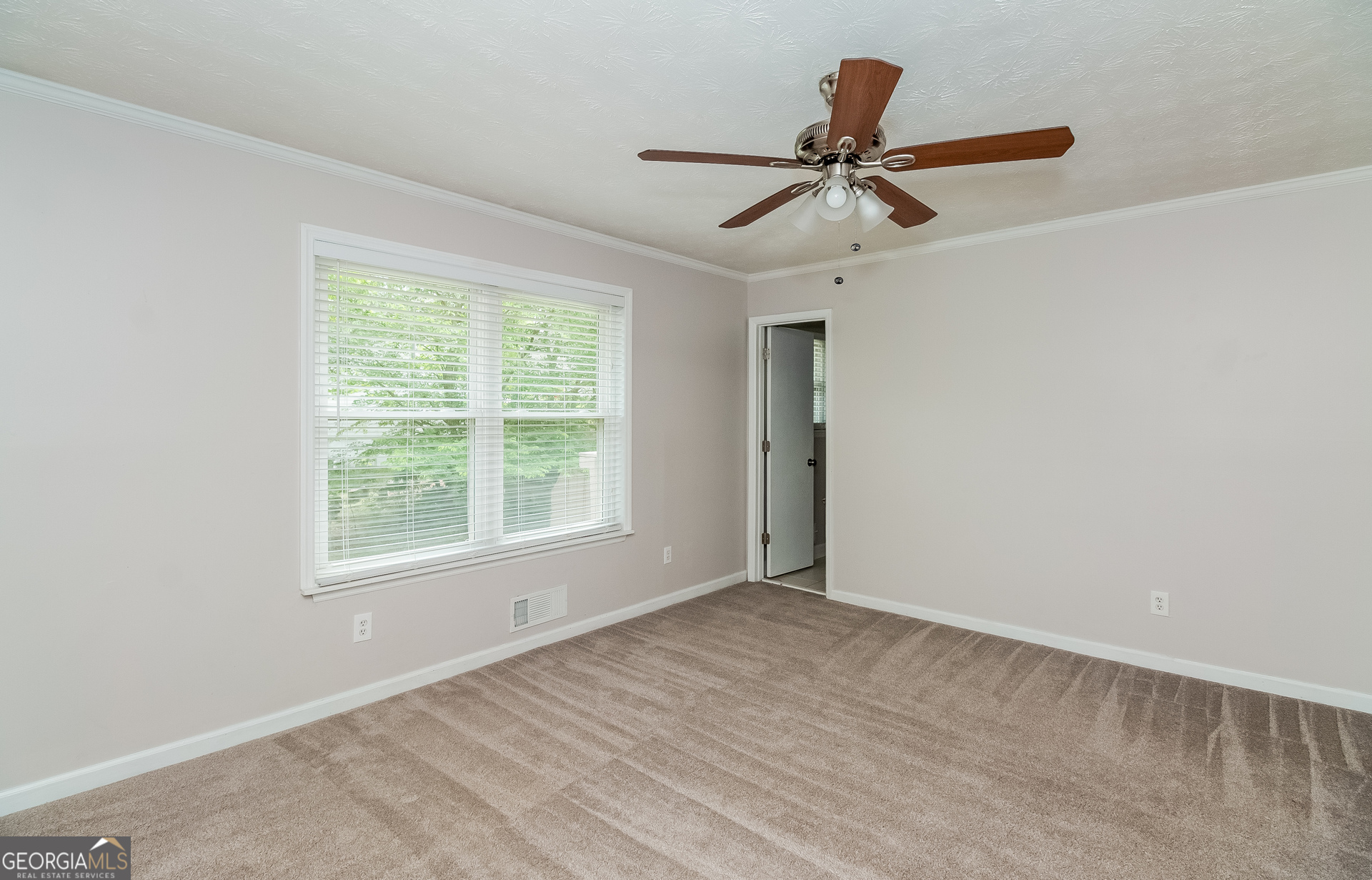 3020 Creel Road South Fulton, GA 30349 - Photo 9 of 18 a view of an empty room with a window