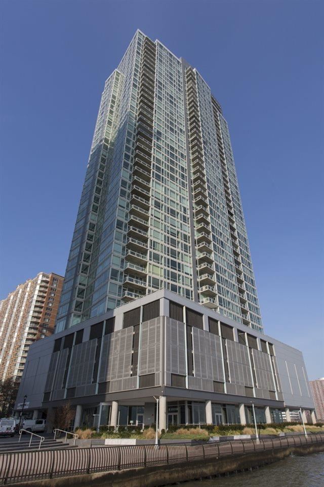 2 2nd Street, Unit 3304 Jersey City, NJ 07302 - Photo 15 of 25 a front view of a building