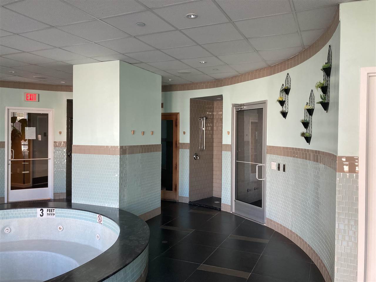 2 2nd Street, Unit 3304 Jersey City, NJ 07302 - Photo 17 of 25 a bathroom with a bathtub and a shower