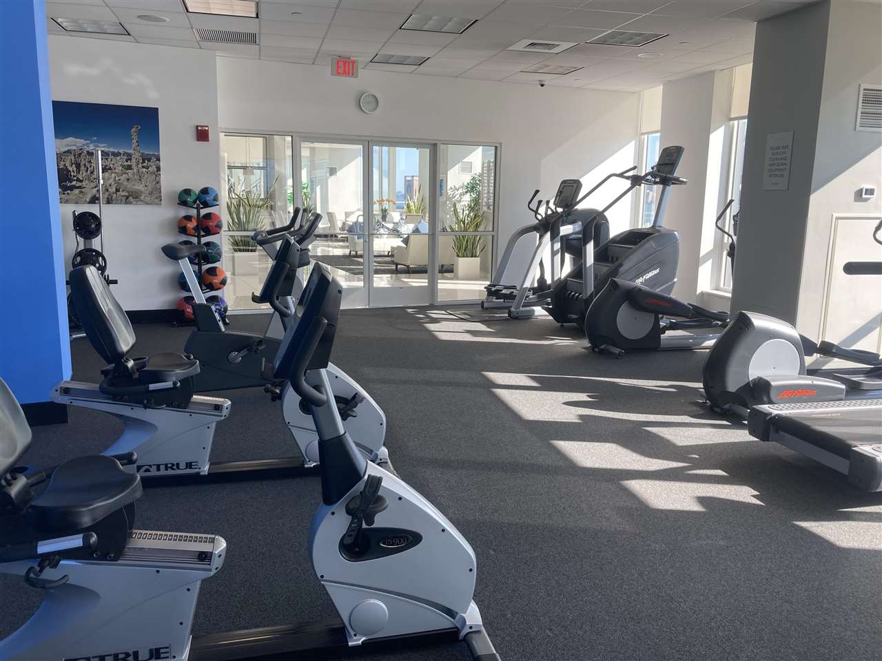 2 2nd Street, Unit 3304 Jersey City, NJ 07302 - Photo 19 of 25 a view of a room with gym equipment