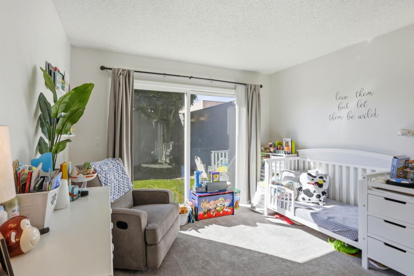 1075 Sherman Drive Salinas, CA 93907 - Photo 14 of 24 a living room with furniture and a potted plant