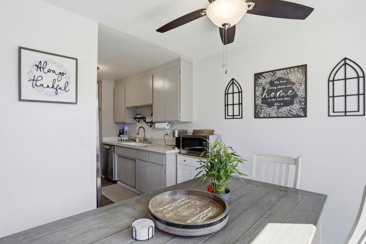 1075 Sherman Drive Salinas, CA 93907 - Photo 7 of 24 a view of a kitchen area with furniture and wooden floor